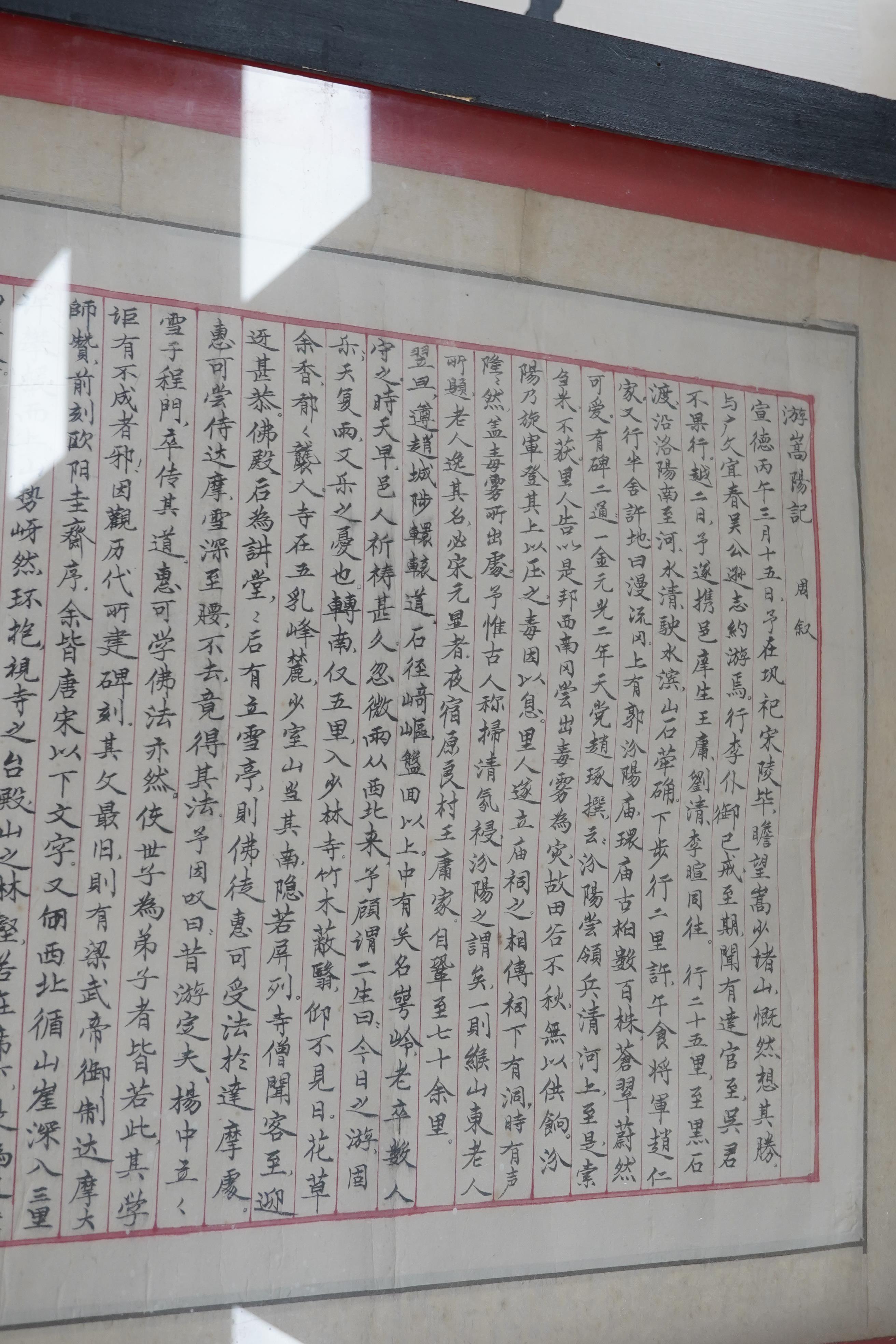 A large Chinese ink calligraphy scroll poem, framed, 174cm excluding the mount and frame. Condition - fair to good